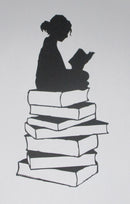 Black Cardstock Girl Sitting on Stack of Books